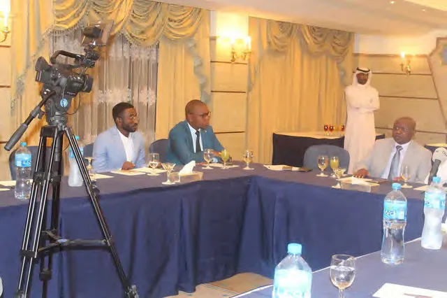 Signing ceremony room in Kuwait, with press cameras and negotiating tables