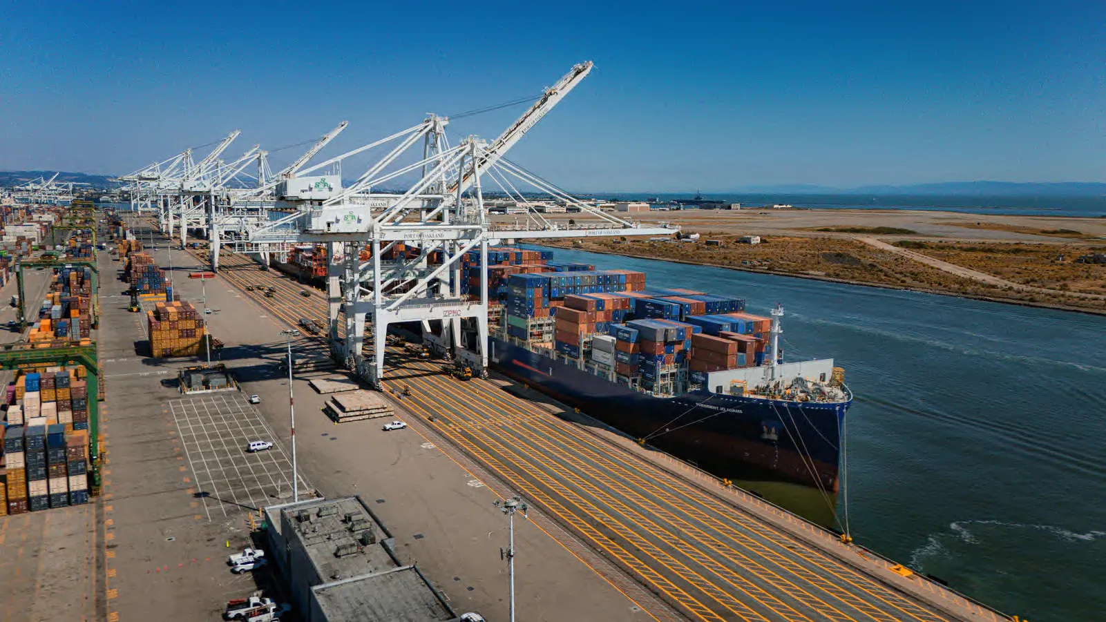 Container port with gantry cranes seen from the air